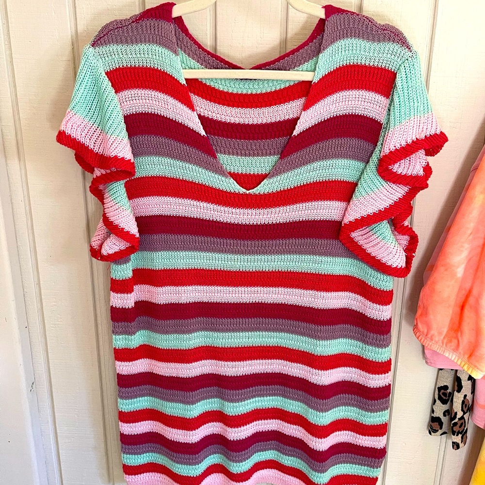 New without tags. Ruffle sleeve bright fun shaker knit sweater sz XL